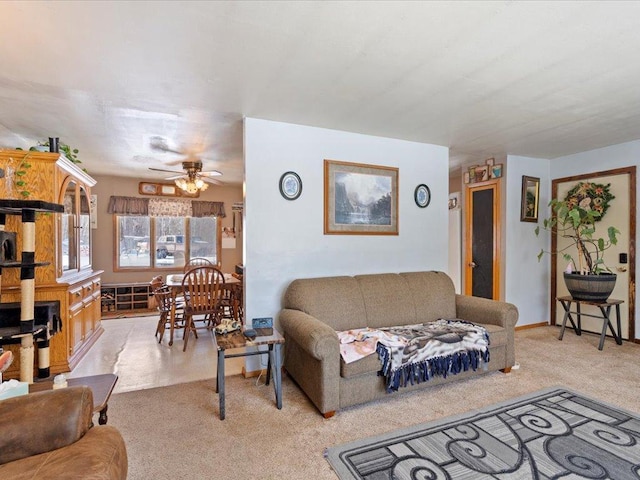 31552 County 23, Akeley, MN 56433 - living room featuring a ceiling fan, light carpet, and baseboards