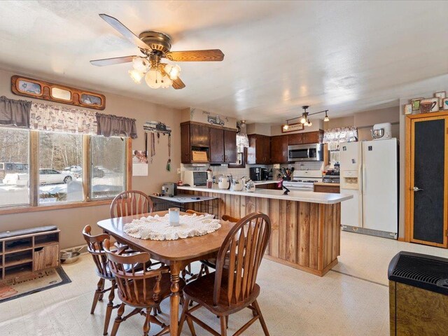 31552 County 23, Akeley, MN 56433 - dining space featuring a ceiling fan and light floors