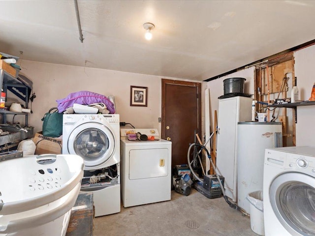 31552 County 23, Akeley, MN 56433 - clothes washing area with laundry area, water heater, a sink, and independent washer and dryer
