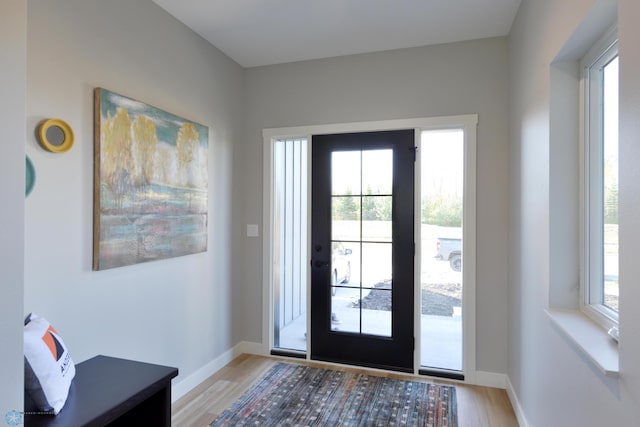 entrance foyer featuring light wood-type flooring