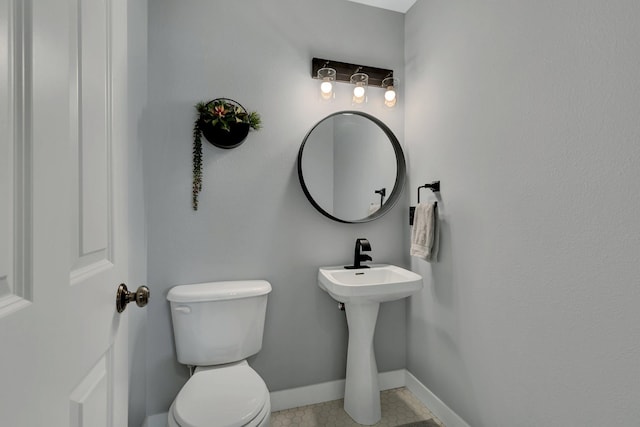 bathroom featuring toilet