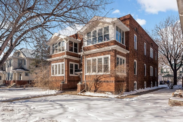 view of front of property with brick siding