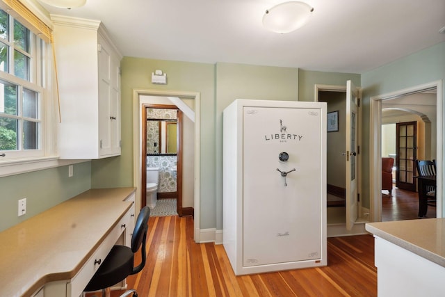 kitchen with white cabinetry and light wood-type flooring