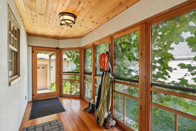 sunroom / solarium with wood ceiling