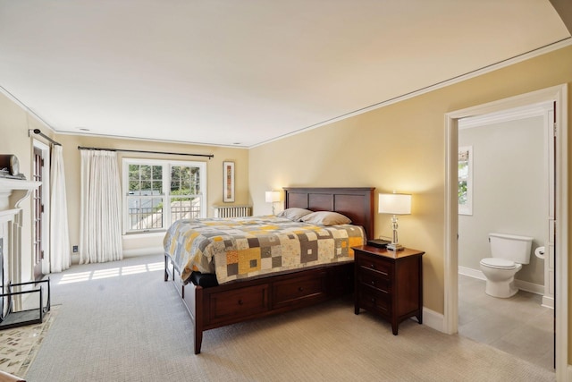 carpeted bedroom featuring ornamental molding