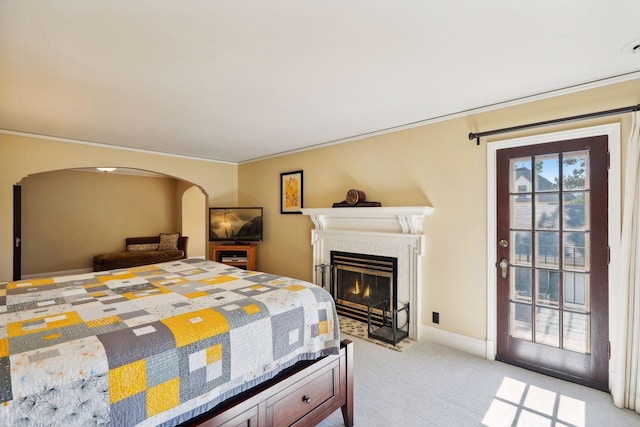 carpeted bedroom with crown molding