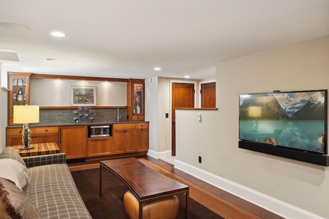 living room featuring dark hardwood / wood-style flooring