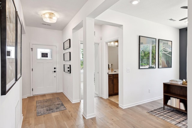 foyer entrance featuring light wood-type flooring