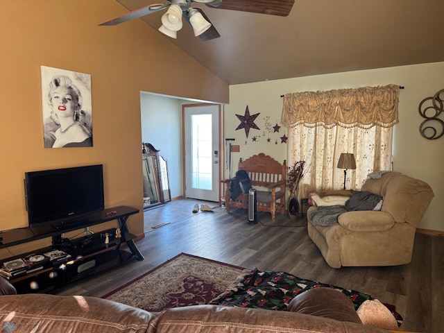 living room with ceiling fan, dark hardwood / wood-style floors, and vaulted ceiling