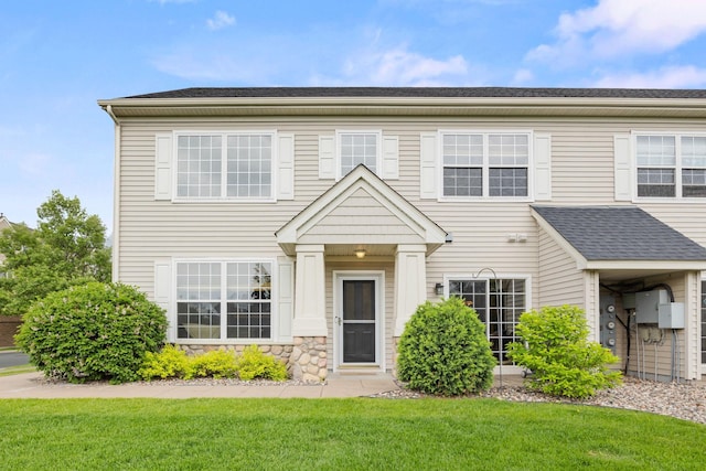 13905 52nd Ave N Unit 701, Plymouth, MN 55446 - view of front facade featuring a front yard and stone siding