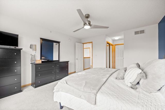13905 52nd Ave N Unit 701, Plymouth, MN 55446 - bedroom with light carpet, ceiling fan, and a textured ceiling