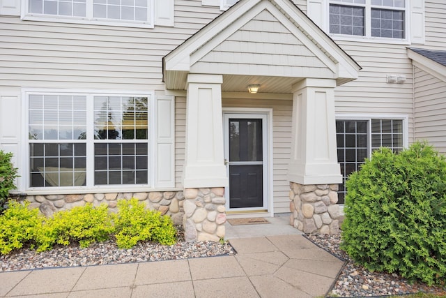 13905 52nd Ave N Unit 701, Plymouth, MN 55446 - doorway to property featuring stone siding