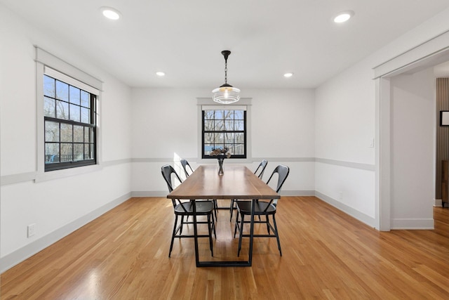 dining area with light wood-style floors, recessed lighting, and baseboards