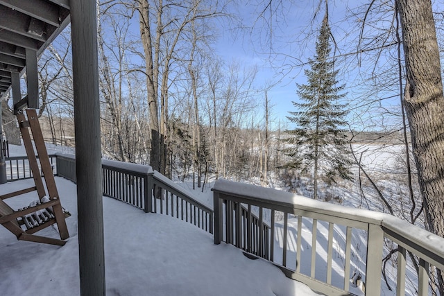 view of snow covered deck
