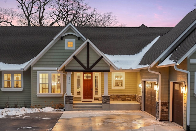 view of front of property with a garage