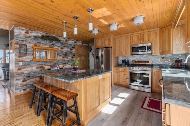 1378 Larrup Trl SW, Pine River, MN 56474 - kitchen with appliances with stainless steel finishes, a sink, wooden ceiling, a kitchen island, and backsplash