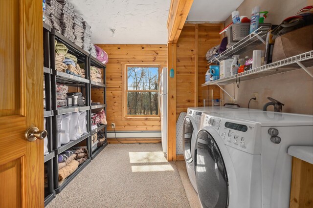 1378 Larrup Trl SW, Pine River, MN 56474 - washroom with a baseboard radiator, wood walls, separate washer and dryer, and light colored carpet