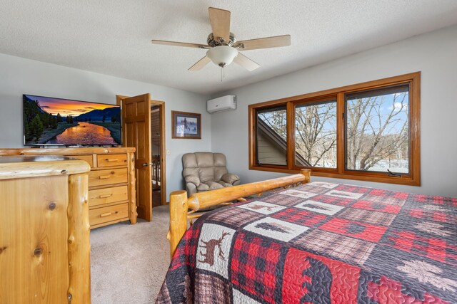 1378 Larrup Trl SW, Pine River, MN 56474 - bedroom with a wall unit AC, carpet, ceiling fan, and a textured ceiling