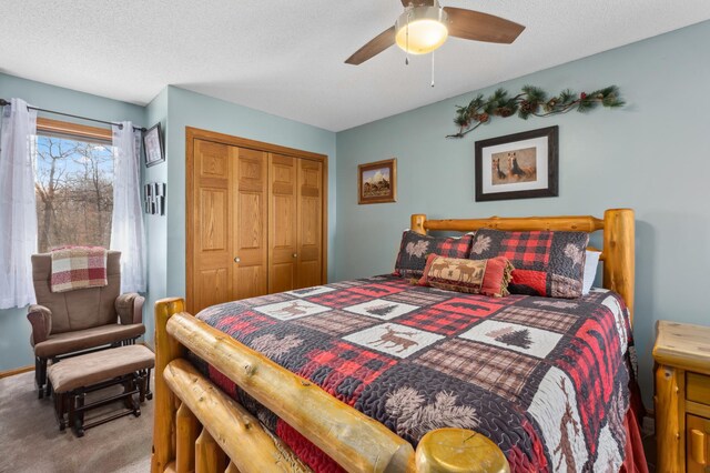 1378 Larrup Trl SW, Pine River, MN 56474 - carpeted bedroom featuring a closet, ceiling fan, and a textured ceiling