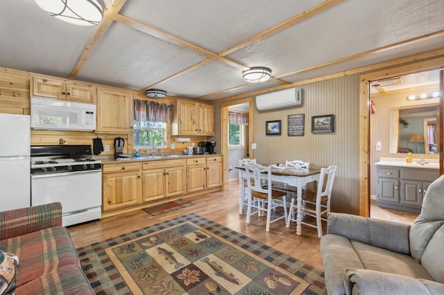 1378 Larrup Trl SW, Pine River, MN 56474 - kitchen with white appliances, a wall mounted AC, wood finished floors, open floor plan, and light countertops