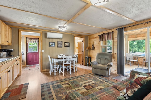1378 Larrup Trl SW, Pine River, MN 56474 - dining area with a wall mounted AC, light wood-type flooring, and wooden walls