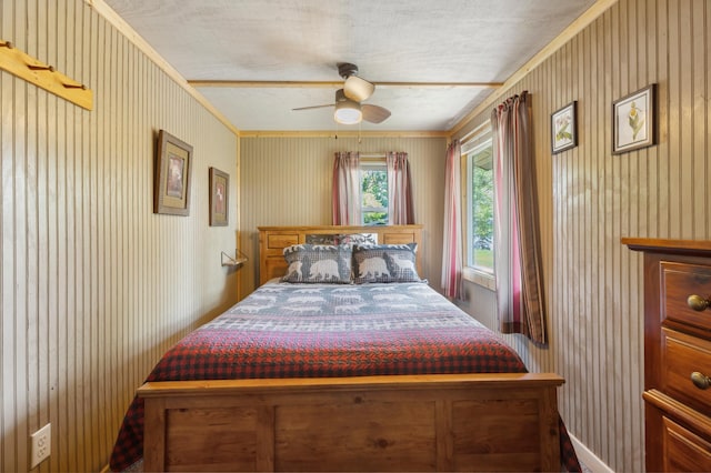 1378 Larrup Trl SW, Pine River, MN 56474 - bedroom featuring ceiling fan, crown molding, and wallpapered walls