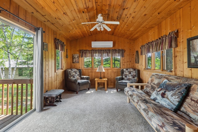 1378 Larrup Trl SW, Pine River, MN 56474 - carpeted living room with a wall unit AC, lofted ceiling, wood walls, and a ceiling fan