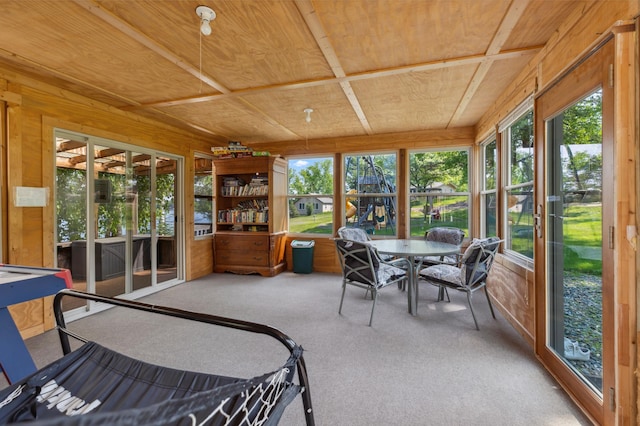 1378 Larrup Trl SW, Pine River, MN 56474 - sunroom with wooden ceiling, healthy amount of natural light, wood walls, and carpet floors