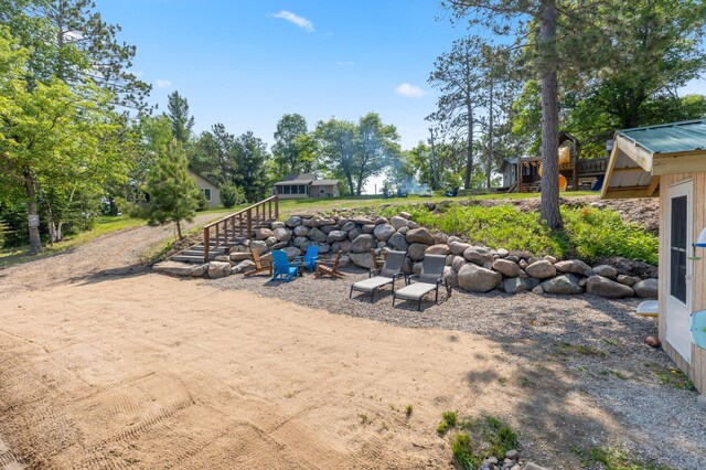 1378 Larrup Trl SW, Pine River, MN 56474 - view of yard with stairs and view of scattered trees