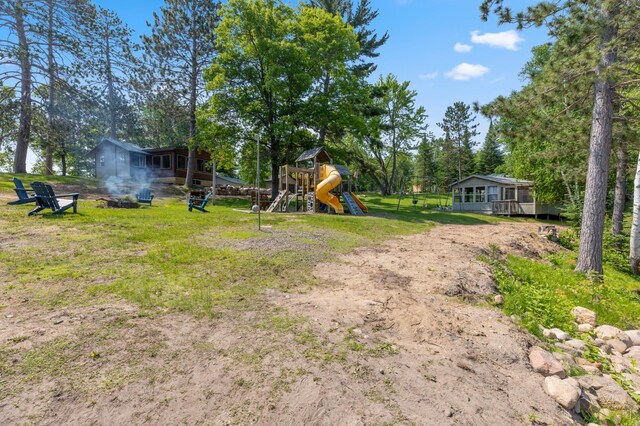 1378 Larrup Trl SW, Pine River, MN 56474 - view of green lawn featuring a playground