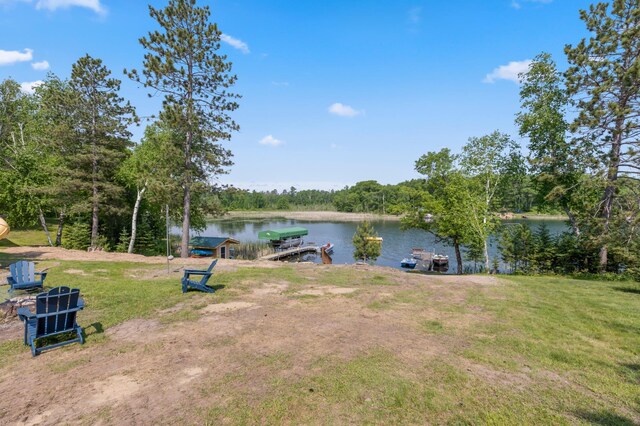 1378 Larrup Trl SW, Pine River, MN 56474 - view of grassy yard with a water view and a dock