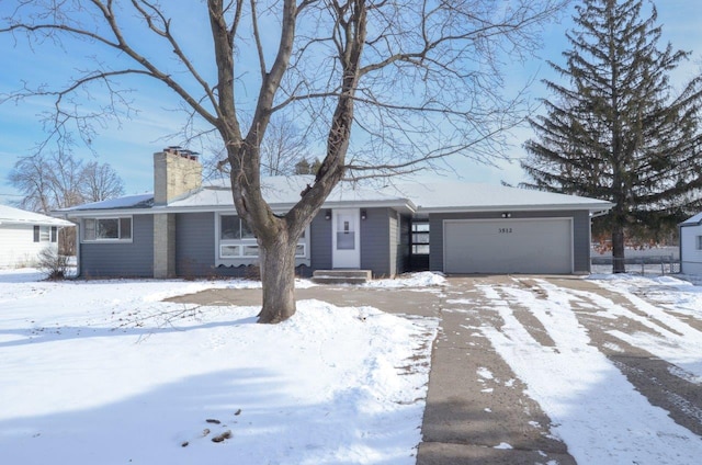 single story home with a garage