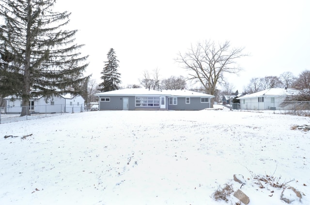 view of snow covered property