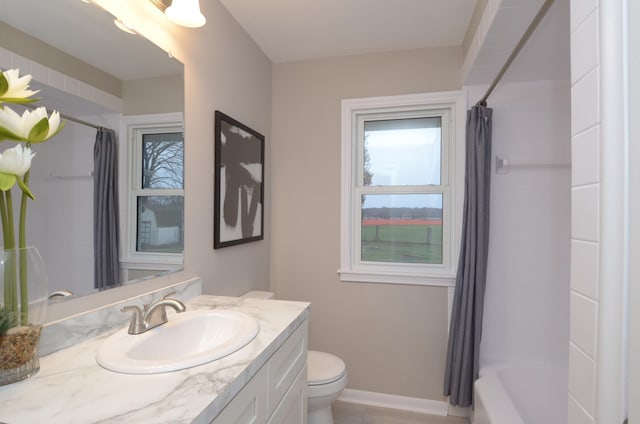 bathroom with toilet, shower / bathtub combination with curtain, and vanity