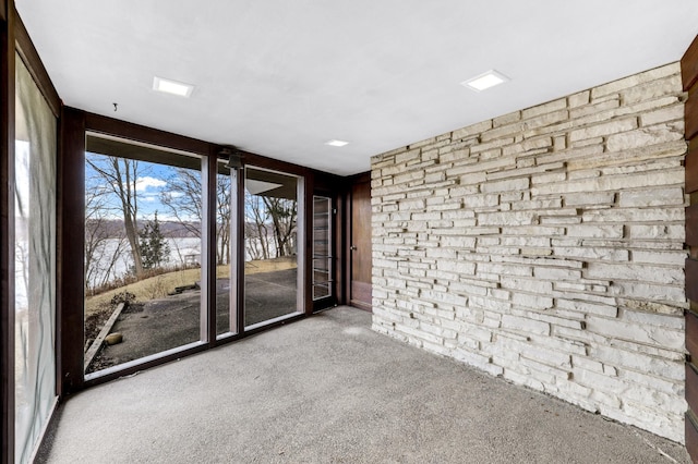 unfurnished room featuring carpet flooring