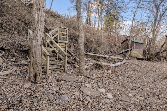 view of yard featuring stairway