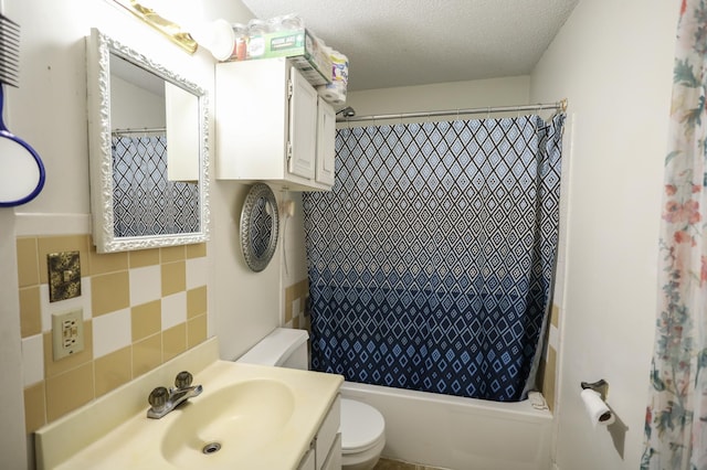 full bathroom featuring shower / tub combo with curtain, vanity, tasteful backsplash, a textured ceiling, and toilet