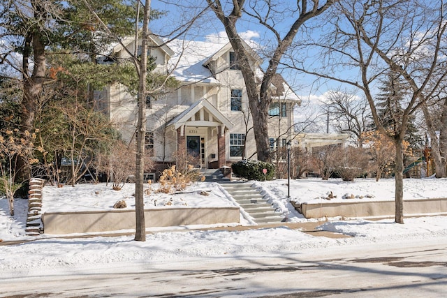 view of front of house with brick siding