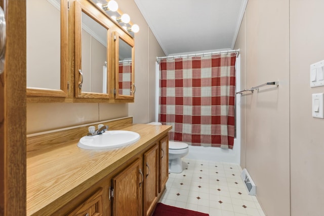 bathroom featuring ornamental molding, toilet, and vanity