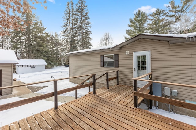 view of snow covered deck