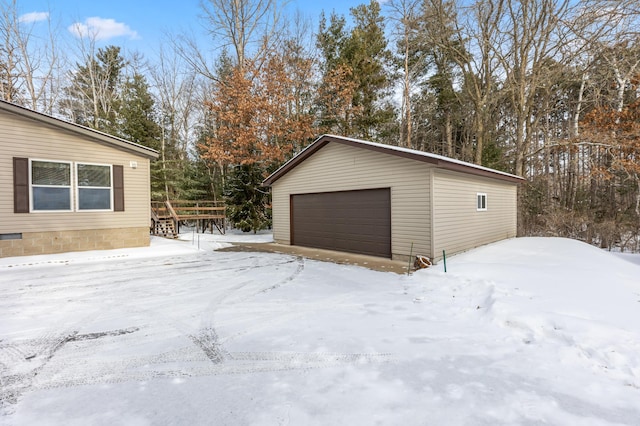 view of snow covered garage