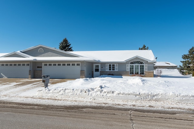 single story home with a garage