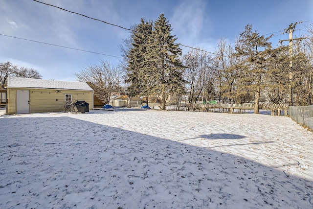 view of yard covered in snow