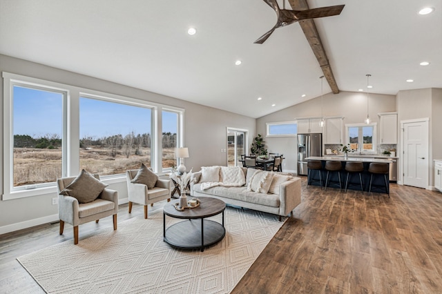 living room with beamed ceiling, ceiling fan, high vaulted ceiling, and light wood-type flooring