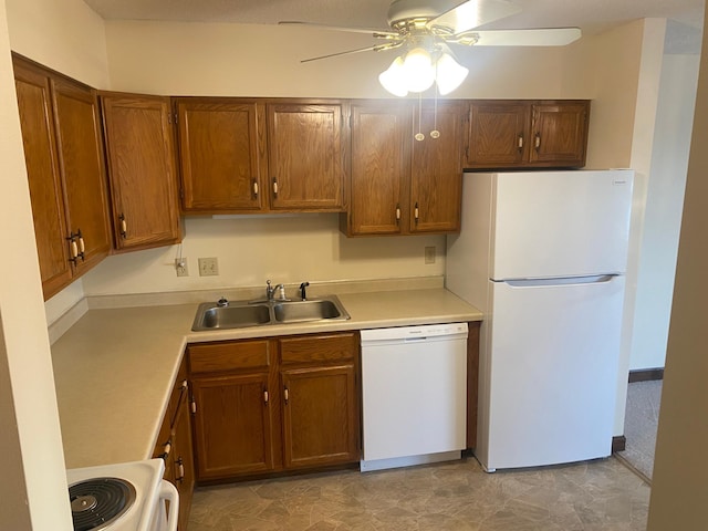 kitchen with ceiling fan, white appliances, and sink