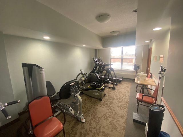 workout area featuring carpet