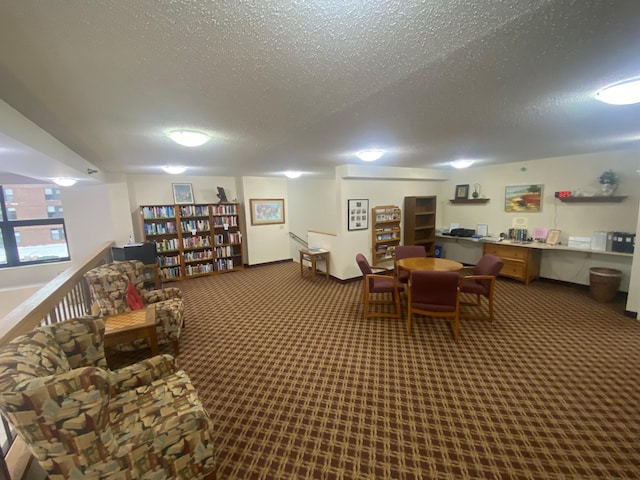 interior space with carpet and a textured ceiling