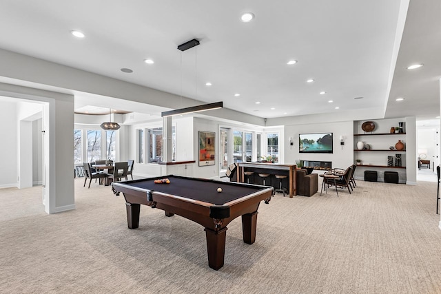 recreation room with recessed lighting, a healthy amount of sunlight, and light colored carpet