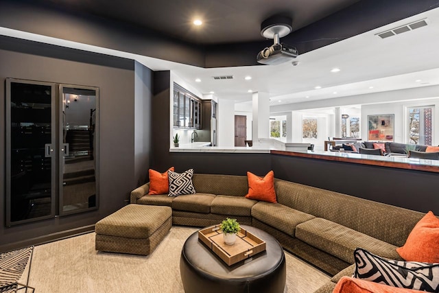 living room with visible vents and recessed lighting