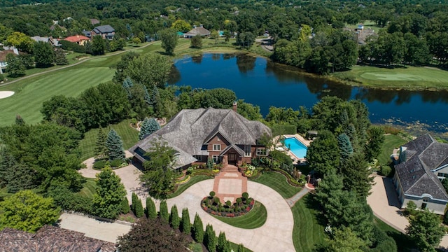 aerial view with view of golf course and a water view